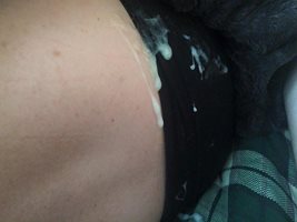 My cum on her ass while she was asleep and unaware.