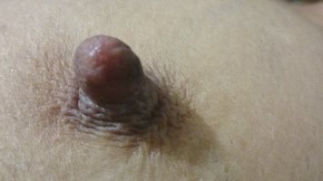 My black or brown hard/erected huge big thick nipple after a long suck. My ...
