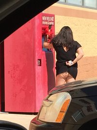 Checking the redbox. showing a little booty