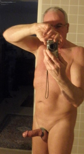 Now here I am showing rather more of myself with my stiff cock on open display... I'm Michael and I love my cock...  Tell me what you think of it or, better still, if you are male cover me in semen and post a tribute... M x