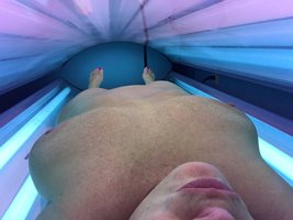 Getting in the tanning bed. .