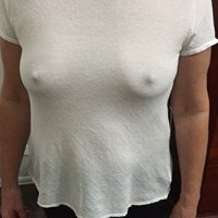 Hubby bought me a new top and thought I should wear it bra-less. What do yo...