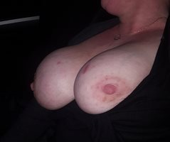 flashing her huge tits for the cam. what would u like to do to them?