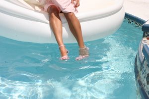 more of "Pink Dress White Float and Heels in the Pool"