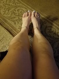 My wifes sexy toes, I love suck on them