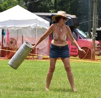 Having fun competing in the beer keg toss!!!  How far do you think I threw ...