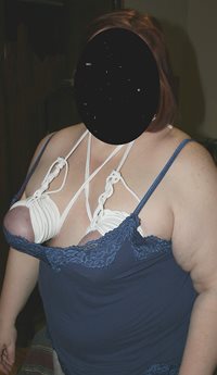 A little rope play on a nice big pair of tits...My slut certainly fills all...