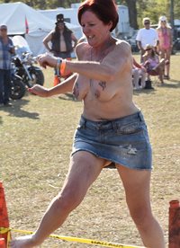 Running the obstacle course topless during the “stripper olympics”!!! I sho...