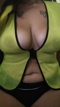 Wife wearing my work vest better than me. You can still see her big tits!