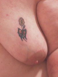 Showing off my very first tattoo. On my left tittie. I hope you like it.