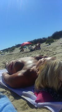 Tits and pussy out on the beach