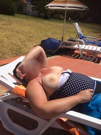 Wife showing tits around the pool