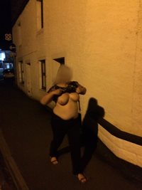 Flashing tits walking past a house