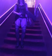 Naughty flasher walking down theatre  stairs New Year's Eve flashing