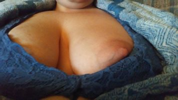 Tits hiding in bath robe