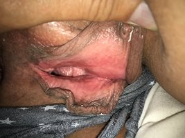 her big pussy lips, spread so you can see the pink happy hole