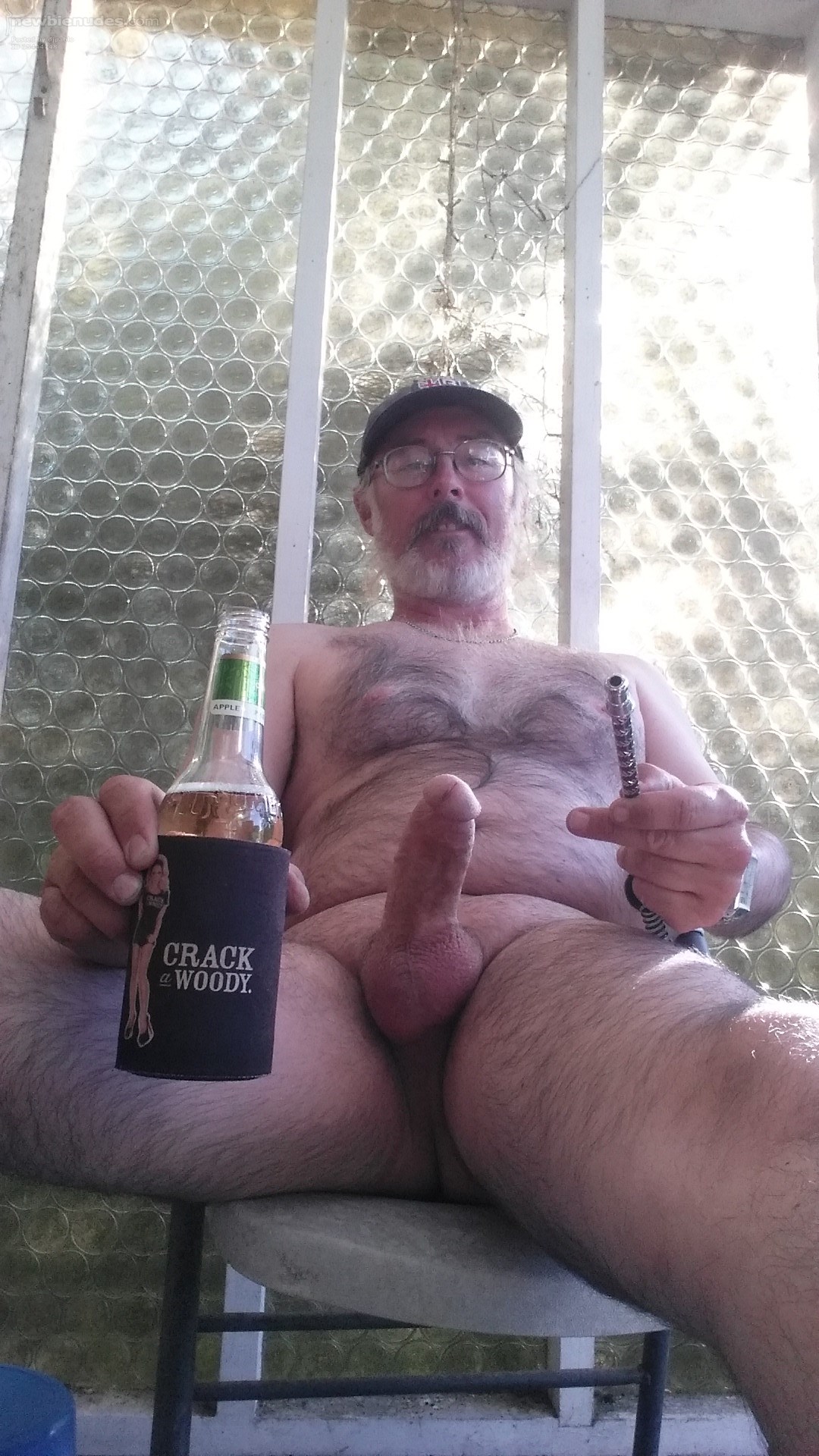On the back deck enjoying the late afternoon sun having a smoke and a bottle of cider. Could I offer you something to suck on?