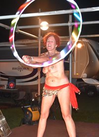 Topless hula hooping!!! Those titties getting to moving in big circles too!...