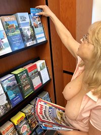 Looking for coupon books at the Florida Welcome Center.