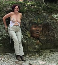 Art - you decide - the carving in stone or the ink and jewelry on my tittie...