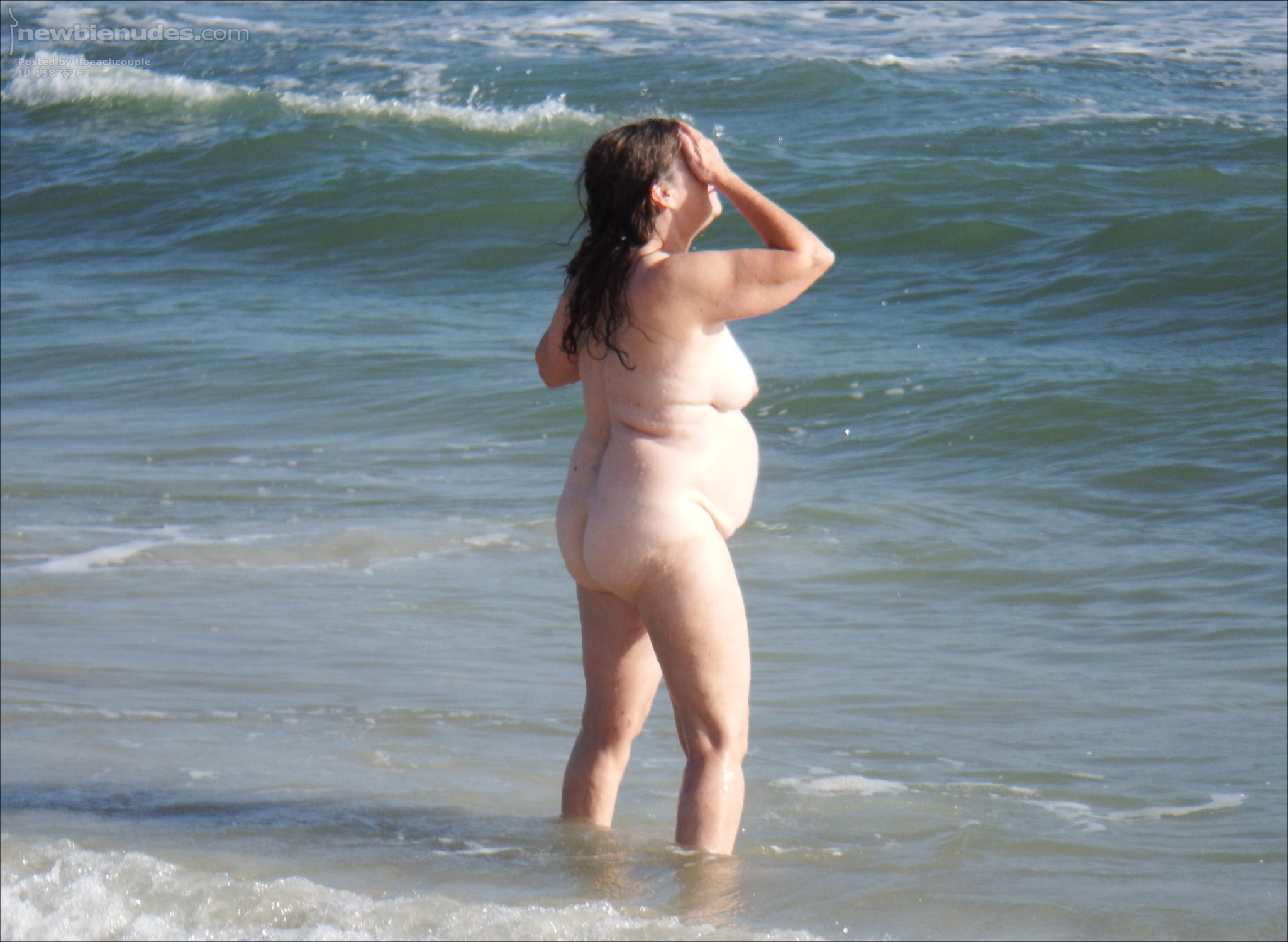 Carol checking out the surf.