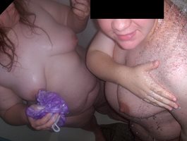 Pic my husband got of me and our pregnant friend in the shower