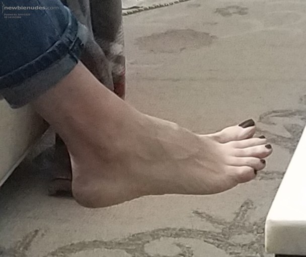 What do you think of her sexy feet?  She'd love cum tributes on it.