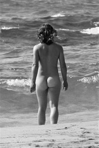 A Black and White view of me going into the ocean at a nude beach