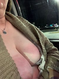 Driving around with tits out for for others to see