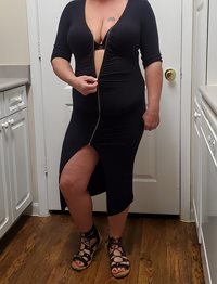 My wifes outfit this last Friday night.  She was teasing me with the zipper...
