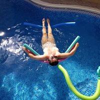 My wife relaxing in the pool