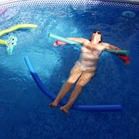 My wife relaxing in the pool