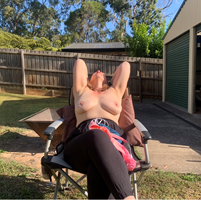 Wife getting some sun on her tits