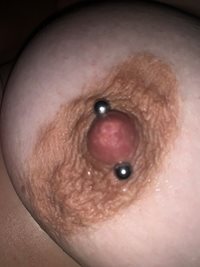 Closeup of  her pierced nipple