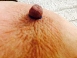 Tried something new...rubber band around my nipples. Felt good at times, st...
