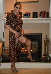 Cougar in Leopard Print Clothing,...