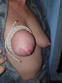 Breast bondage with rope
