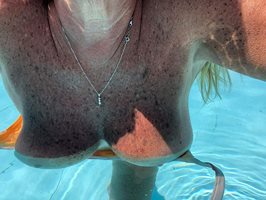 Big Double D boobs floating in the pool today !