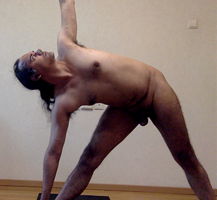 Indian male in yoga pose.
