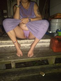 Wife flashing on the front porch yesterday evening. She got wet with the ca...