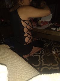 My 47 year old wife. I love this dress on her. Shows just enough, but not t...
