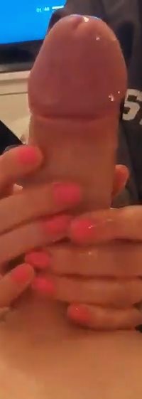Oiled hand job with neon pink nails