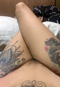 legs with tattoo