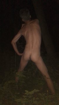 Dancing nude in a forest