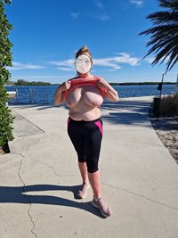 Flashing her tits while out for a walk in Florida