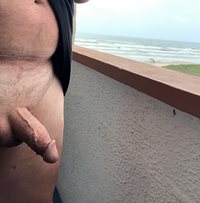Naked on hotel balcony