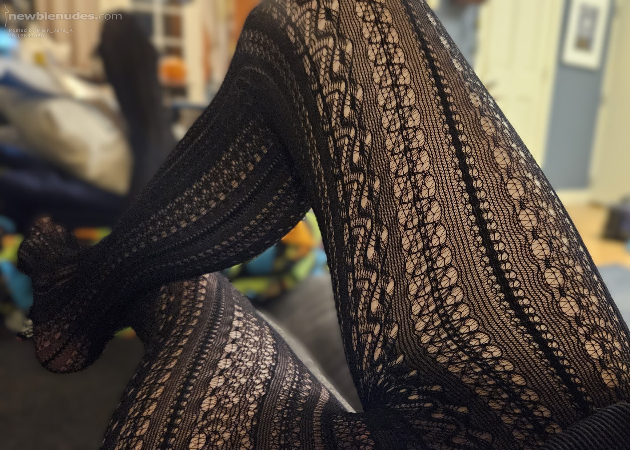 Crossdressing and lounging in fishnet stalkings