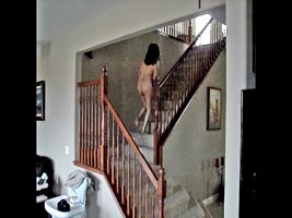 Flashing my naked ass running up the stairs.