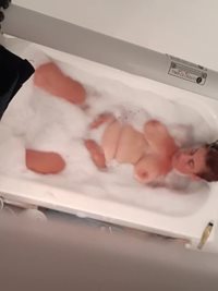 Sonja playing with her herself in the bath