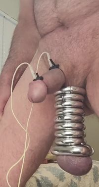 Ball stretching/electro orgasm.
